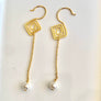 LONG PEARL LINEAR EARRINGS