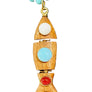 Wooden fish-shaped pendant with colorful stones on a dark textured background