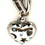 • Silver color plated brass chain (60cm)
• Heart pendant with celestial cutouts (moon, star, heart)
• Turquoise details for a unique, trendy look
• Stylish and versatile – wear alone or mix & match with other necklaces