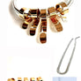 Gold and silver jewelry set including a necklace, bracelet, and rings on a white background.