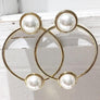 circular-ring-pearl-statement-earrings