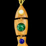 Wooden pendant with embedded stones on a textured gray background